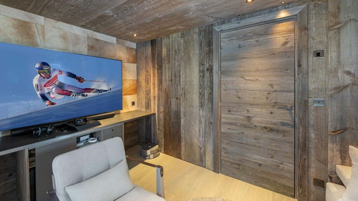 Luxury-Ski-Chalet-Courchevel-1850-Chalet-Bellarossa-Oxford-Ski-TV-Room (6).jpg