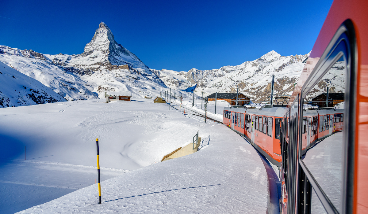 Matterhorn thick snow with view from the iconic red mountain rail trian.